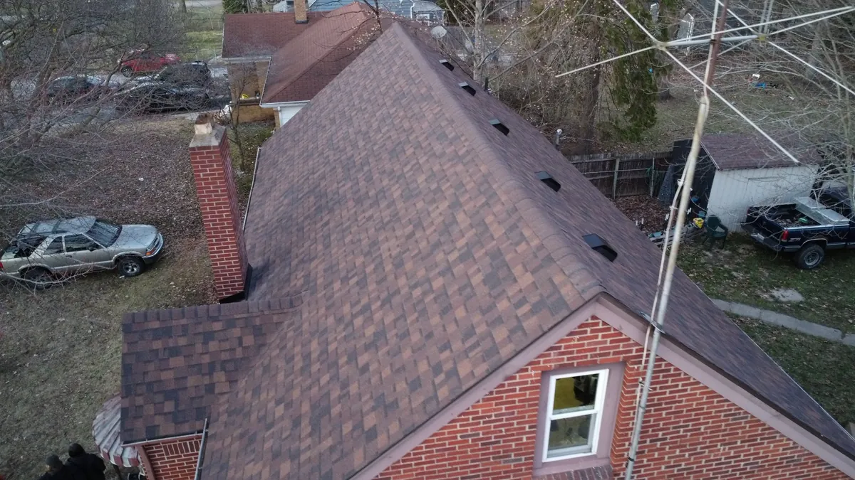 Aerial view of a brick home in Defiance with a newly replaced roof
