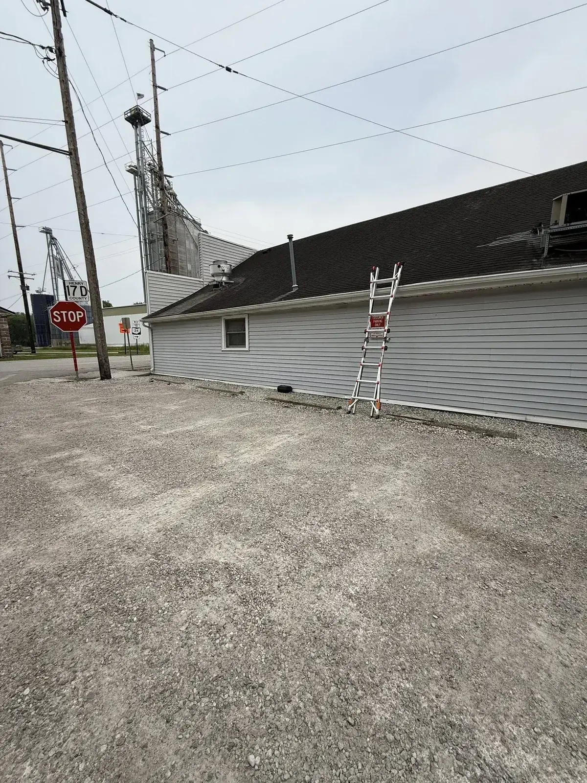 Ladder access on grain elevator roof job in Northwest Ohio