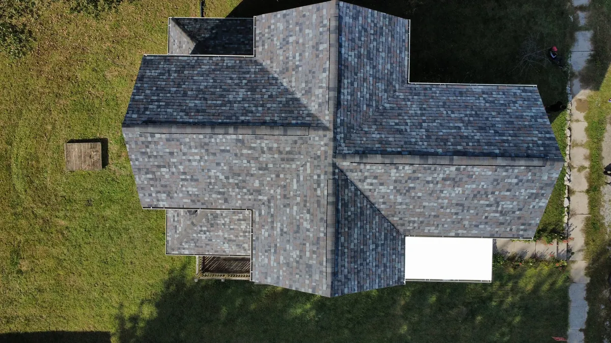 Aerial view of a completed shingle roof on a home in Northwest Ohio
