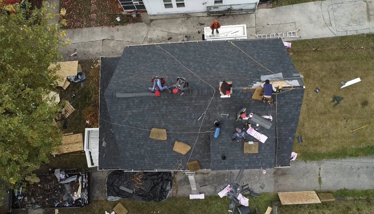 Roofing crew performing a free roof inspection in Northwest Ohio