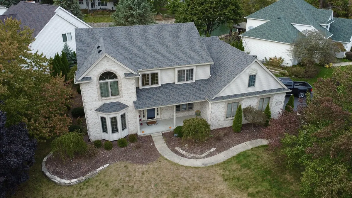 Bay window on a luxury home with new roofing in Perrysburg, Ohio