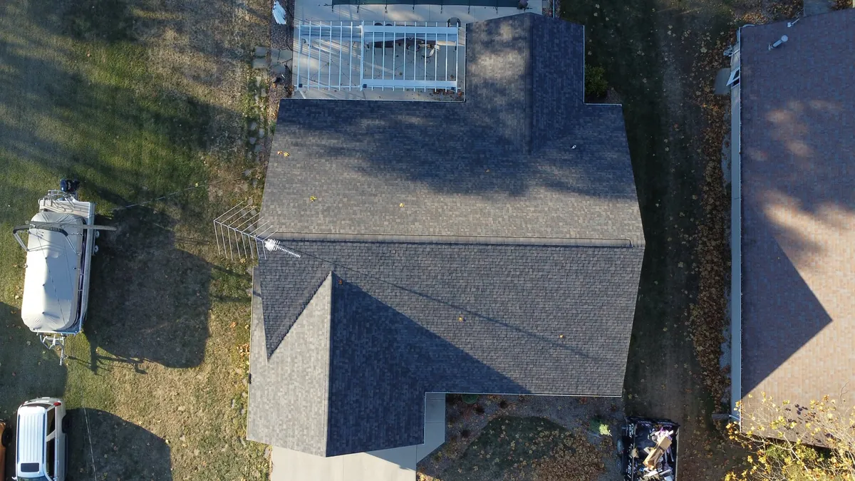 Finished gray architectural shingle roof on a residential home east of Napoleon, Ohio