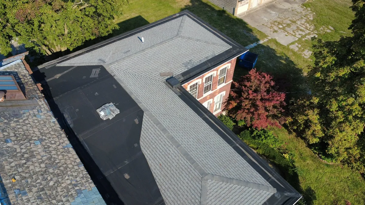 Aerial view of flat commercial roof on historic building in NW Ohio