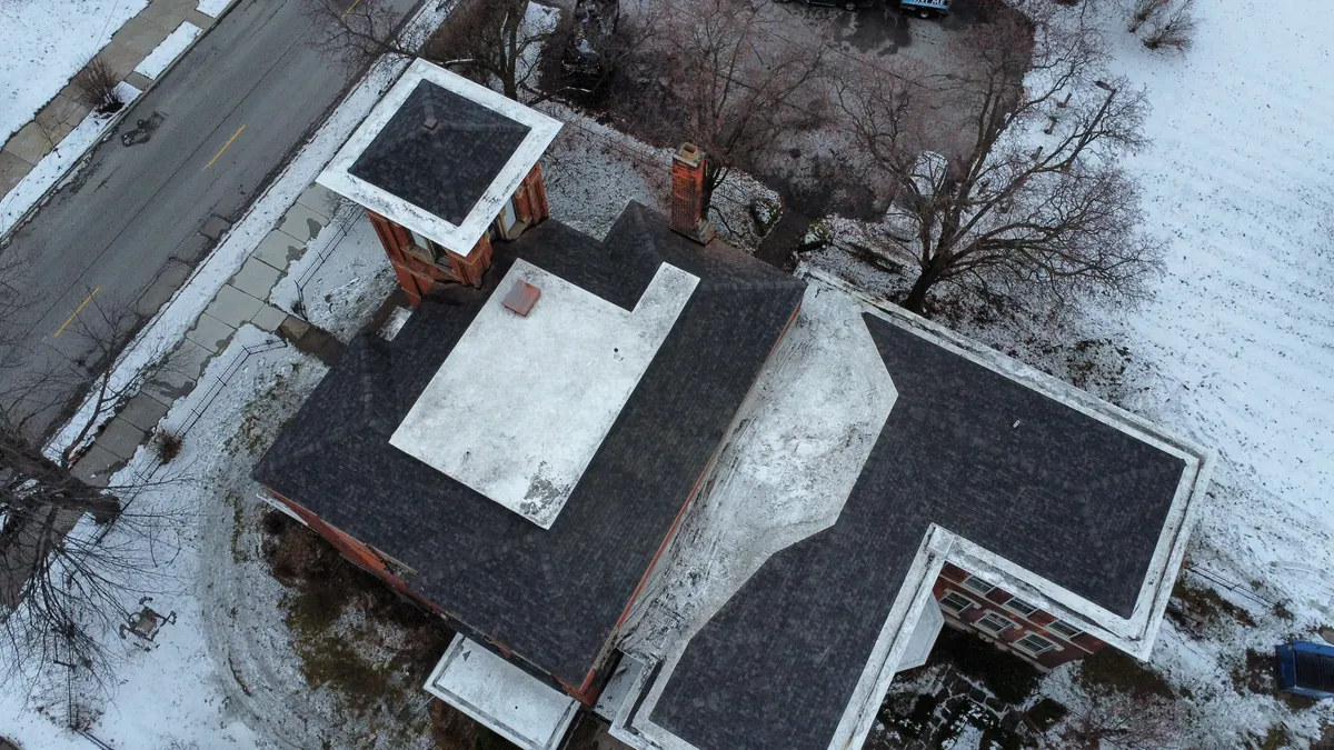 Aerial view of commercial flat roof during winter in Northwest Ohio